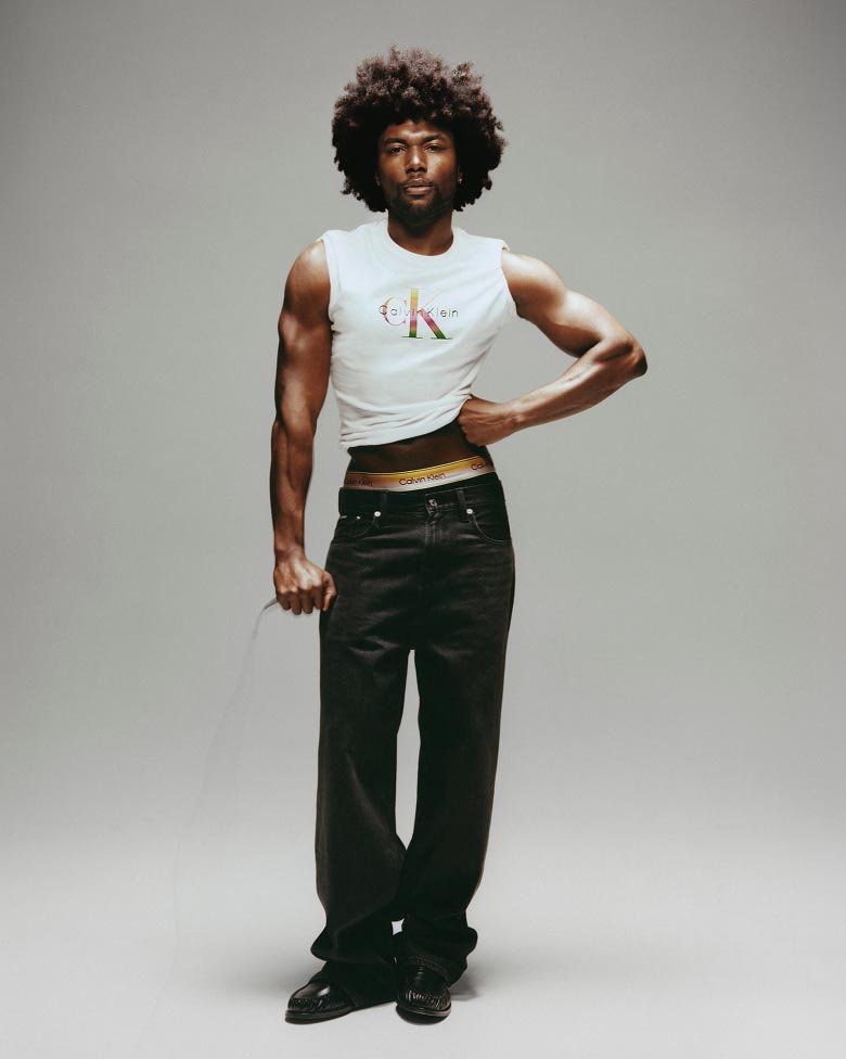 Deon Hinton posing in Calvin Klein Pride styles